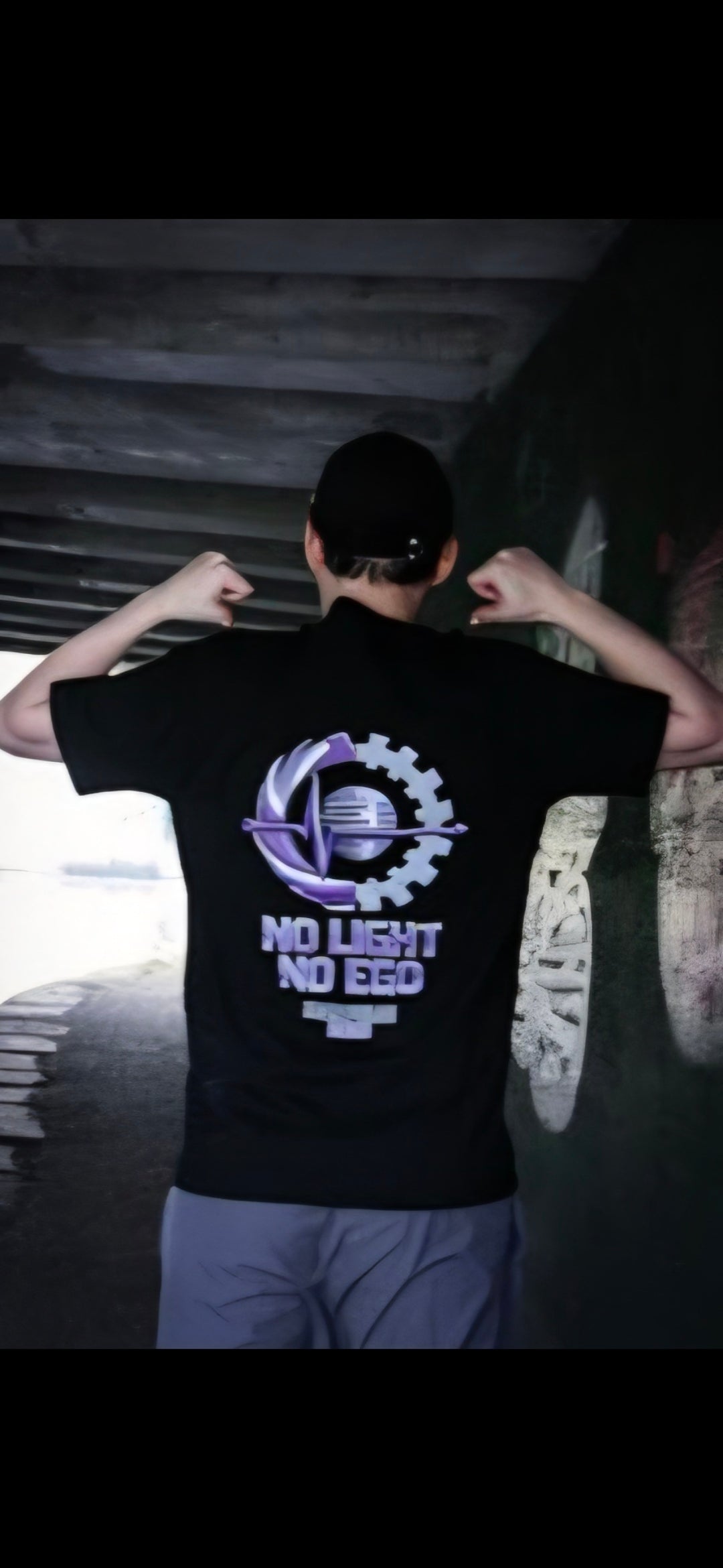 Step into the pulse of the night. This black tee isn’t just clothing it’s a statement in motion. Featuring a bold, futuristic logo that feels like it was pulled straight from a neon-lit dance floor, this piece captures the energy of underground raves and late-night freedom. Designed for movement, expression, and individuality, it’s made for those who don’t just follow the vibe they create it.
This is more than a shirt. It’s the beginning of the movement